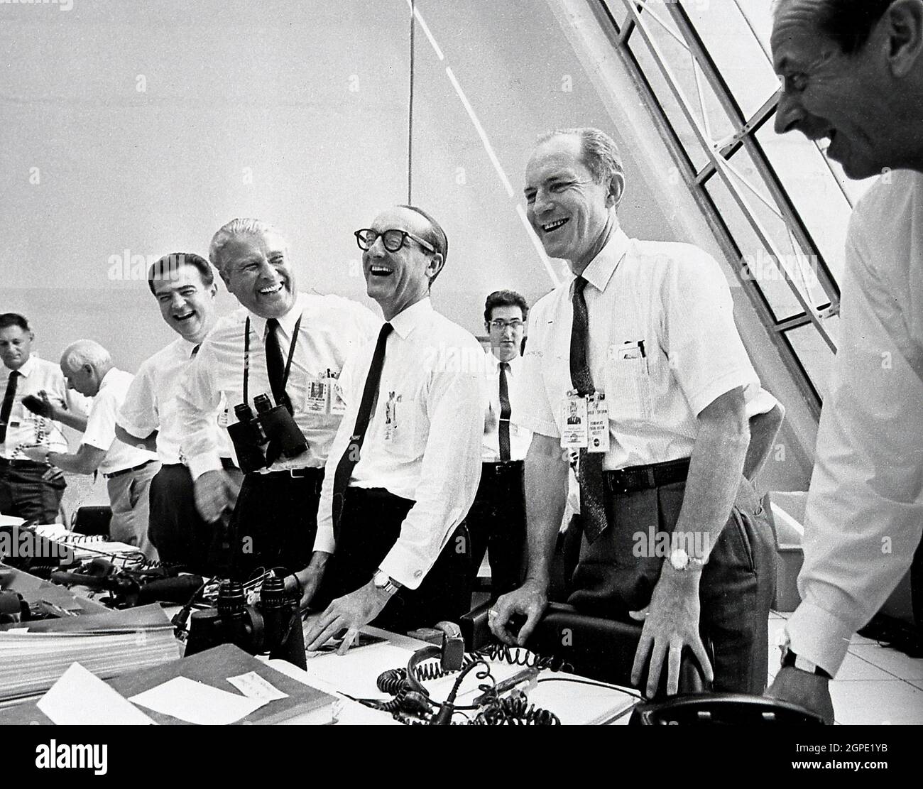 7/16/69 Mission Officials (Including Dr,Von Braun) Relax in the Launch Control Center Following the Successful Apollo 11 Liftoff 69-H-1159, NASA officials, (left to right) Charles W. Mathews; Dr. Wernher von Braun, Director, Marshall Space Flight Center (MSFC); Dr. George E. Mueller, Associate Administrator for Marned Space Flight; and Air Force Lt. General Samuel C. Phillips, Apollo Program Director celebrate the successful launch of Apollo 11 in the control room at Kennedy Space Center (KSC) on July 16, 1969. Boosted by the Saturn V launch vehicle, the Apollo 11 mission with a crew of three: Stock Photo