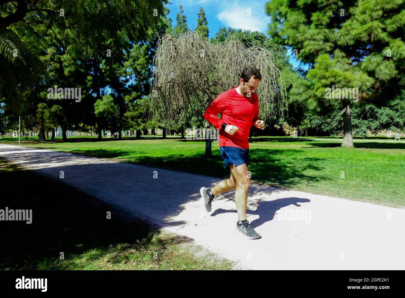 Active Man running park, healthy lifestyle Stock Photo