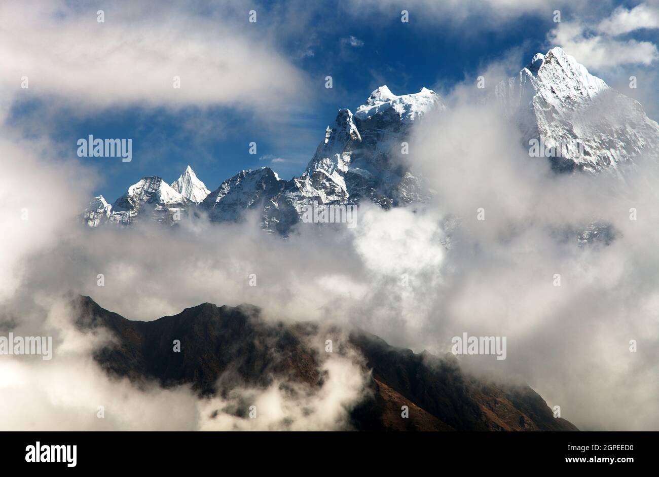 Kangtega and Thamserku - beautiful mounts above the Namche Bazar on the way to Everest Base Camp - Nepal Stock Photo