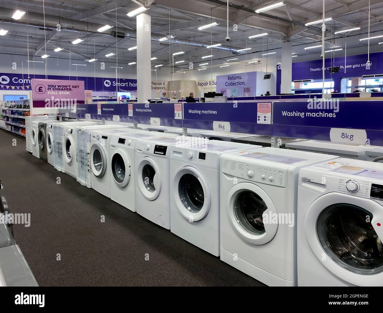 Washing machines for sale in an electrical store. United Kingdom. Stock Photo
