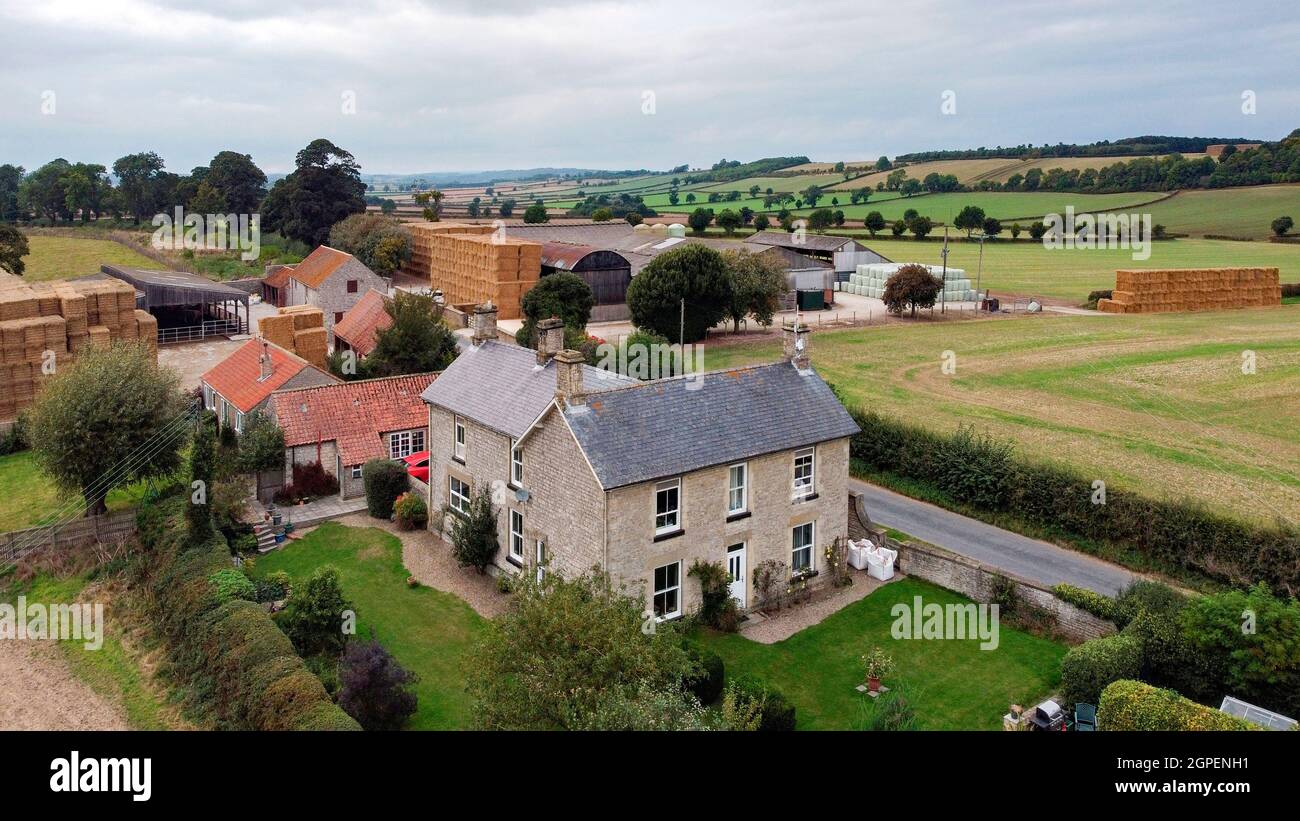 Farm buildings and farmland in the countryside of North Yorkshire in the northeast of the United
