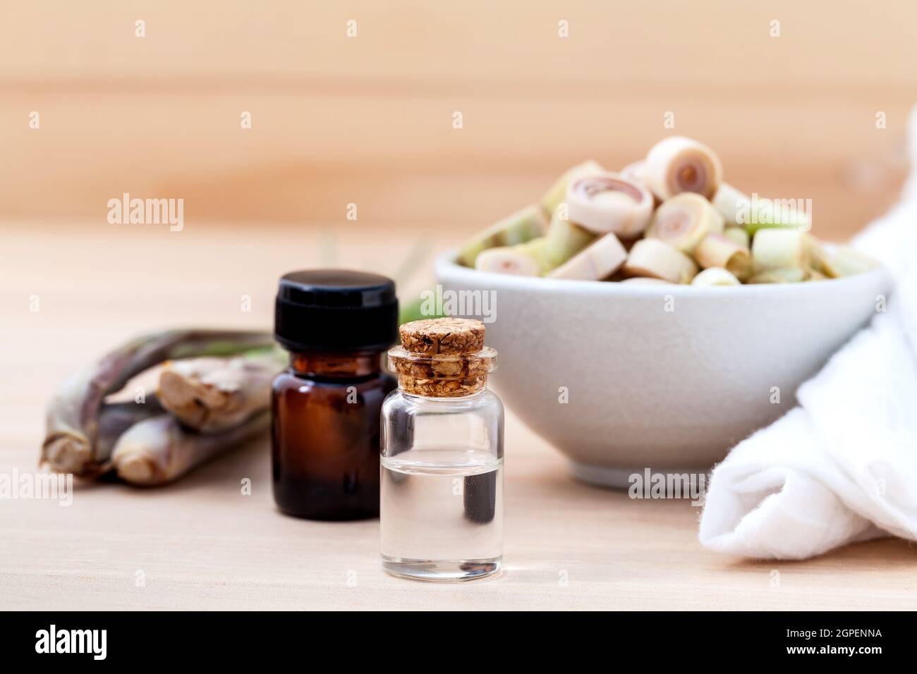 Natural Spa Ingredients Lemongrass essential Oil  with Aromatherapy Burners on wooden background. Stock Photo