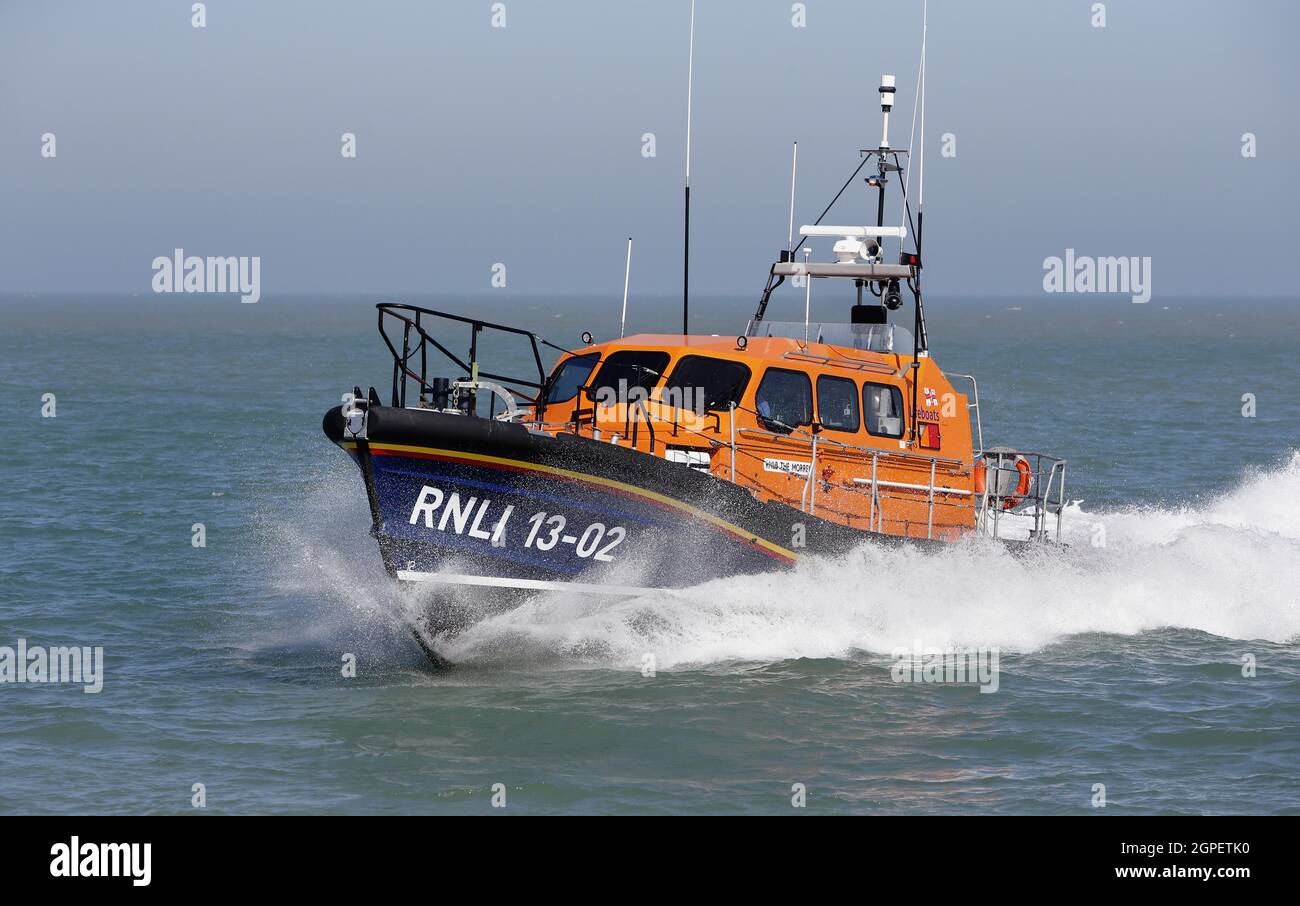 England, Kent, Dungeness, RNLI Lifeboat speeding towards land. Stock Photo