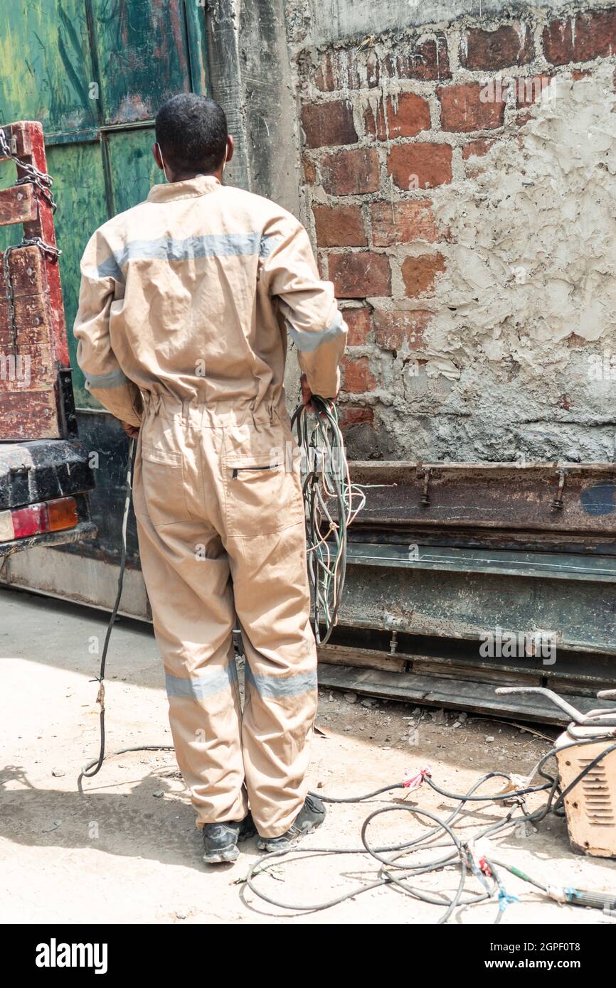 Back welder working in the workshop Stock Photo