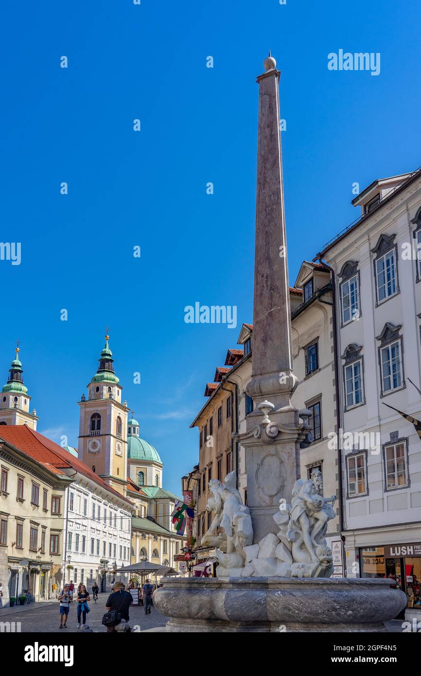 09.08.2021: Ljubljana, Slovenia: Ljubljana old town center with robba fountain and people . Stock Photo