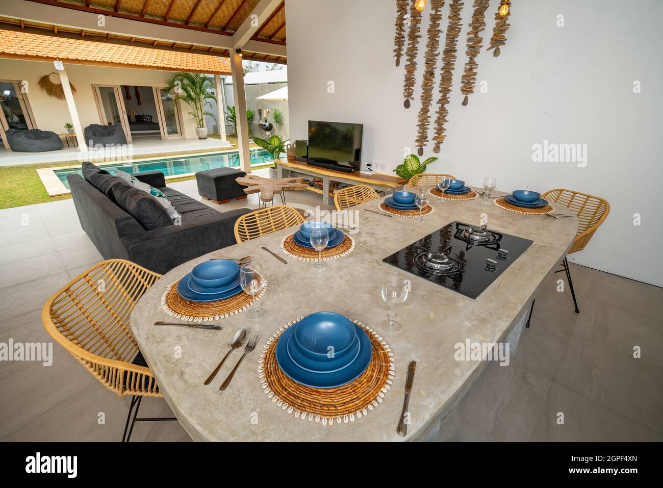 kitchen concrete table with gas stove. Dining room with living room