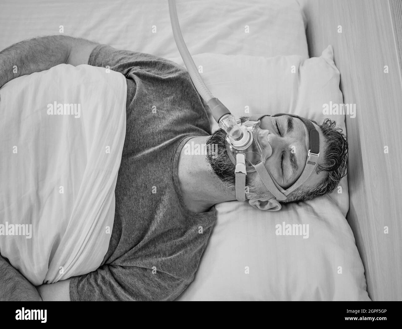 Man sleeping with apnea and cpap hires stock photography and images