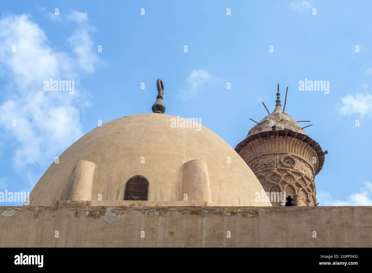 Dome at public historic mosque of Sultan Al Nassir Qalawun revealing minaret of Mamluk era El Zaher Barquq Mosque, Moez Street, Cairo, Egypt Stock Photo
