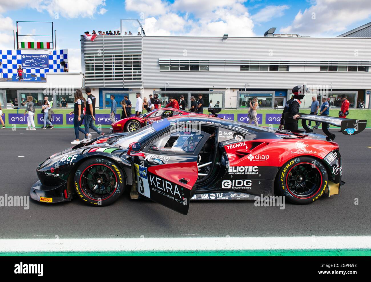 Vallelunga, italy september 19th 2021 Aci racing weekend. Car on race starting grid, Ferrari 488 GT endurance with team people Stock Photo