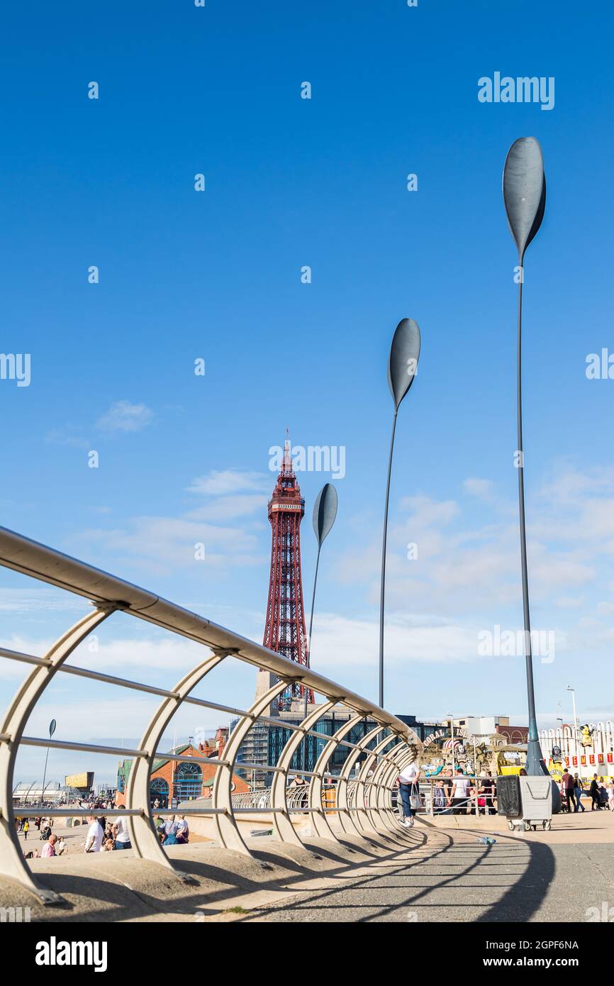 Giant sculptures seen in front of Blackpool Tower under a blue sky in September 2021 Stock Photo