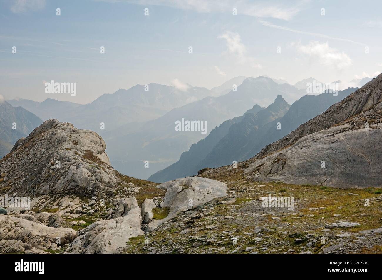 Alpine landscape in which the traces of a long-disappeared glacier are still visible through the rounded rocks Stock Photo