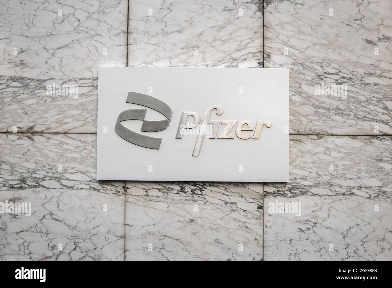 New York, NY, US - August 24, 2021:  Pfizer office building in Manhattan. Pfizer is an American multinational pharmaceutical corporation. Stock Photo