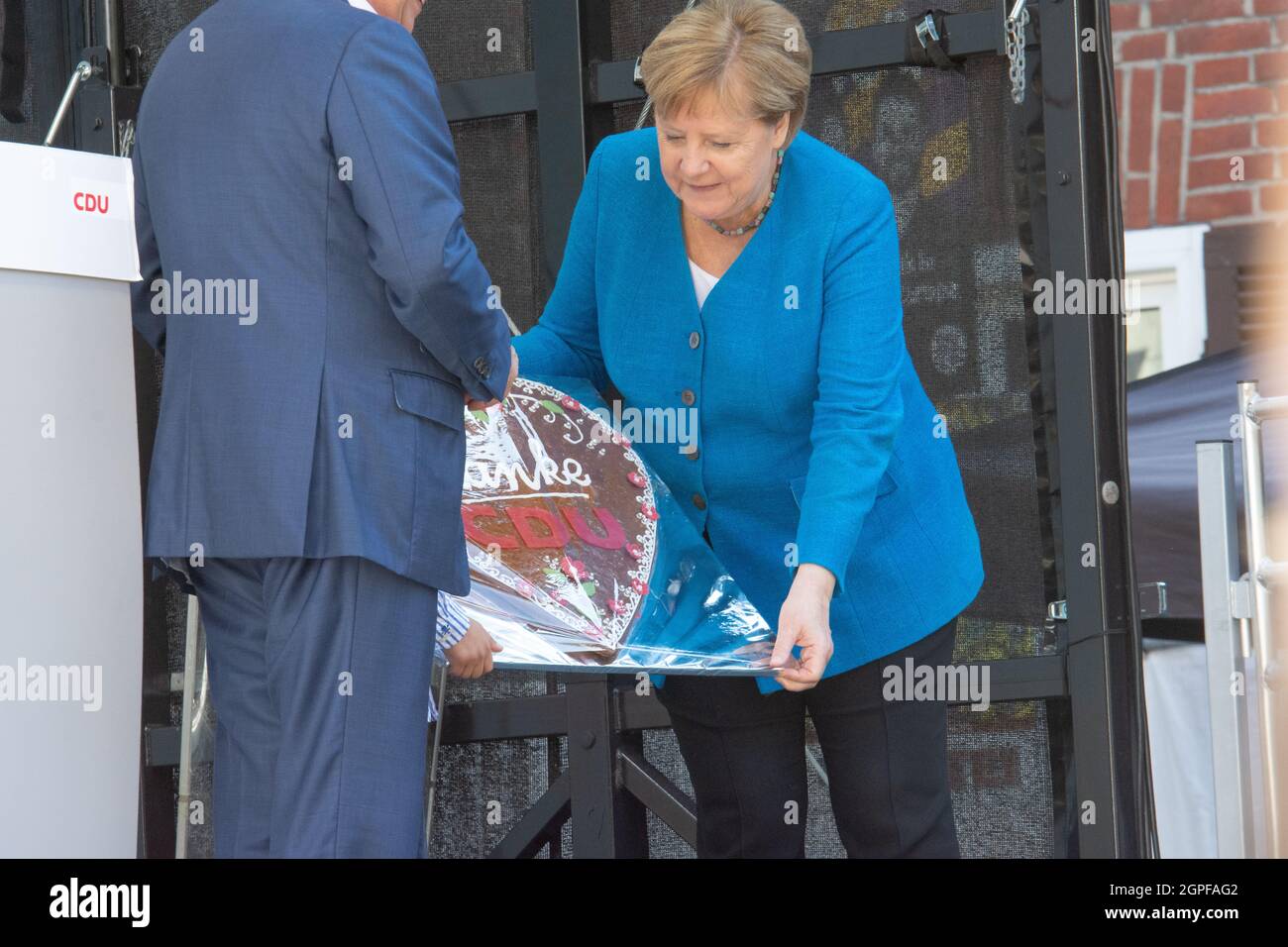 Chancellor Angala Merkel, Rudolf Henke and Armin Laschet at an election rally on the stage Stock Photo