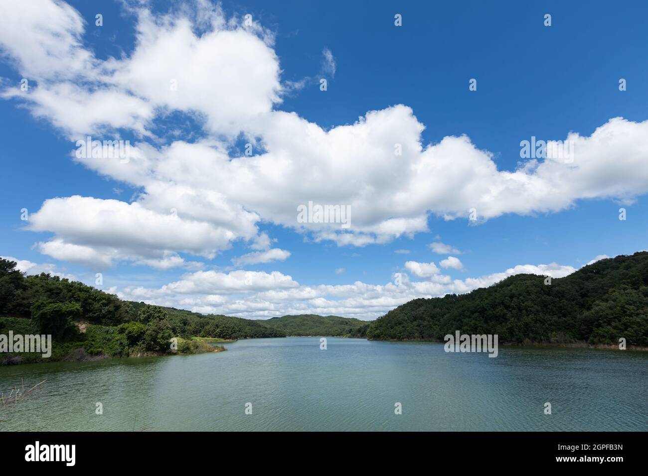 landscape of beautiful blue sky with white clouds, Imdong dam reservoir, Korea Stock Photo