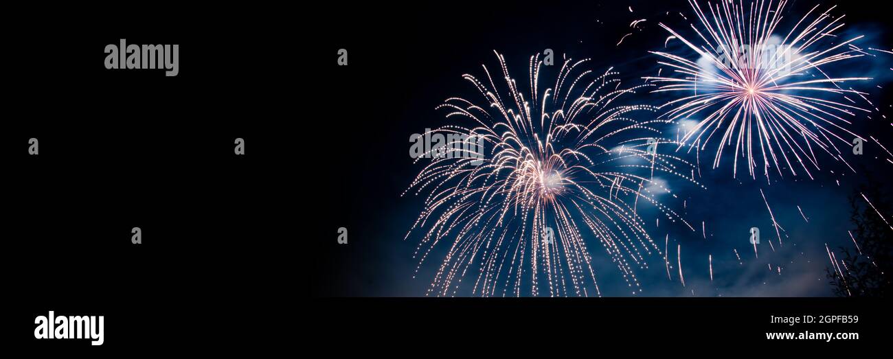 Fireworks panoramic background. Celebration web banner Stock Photo