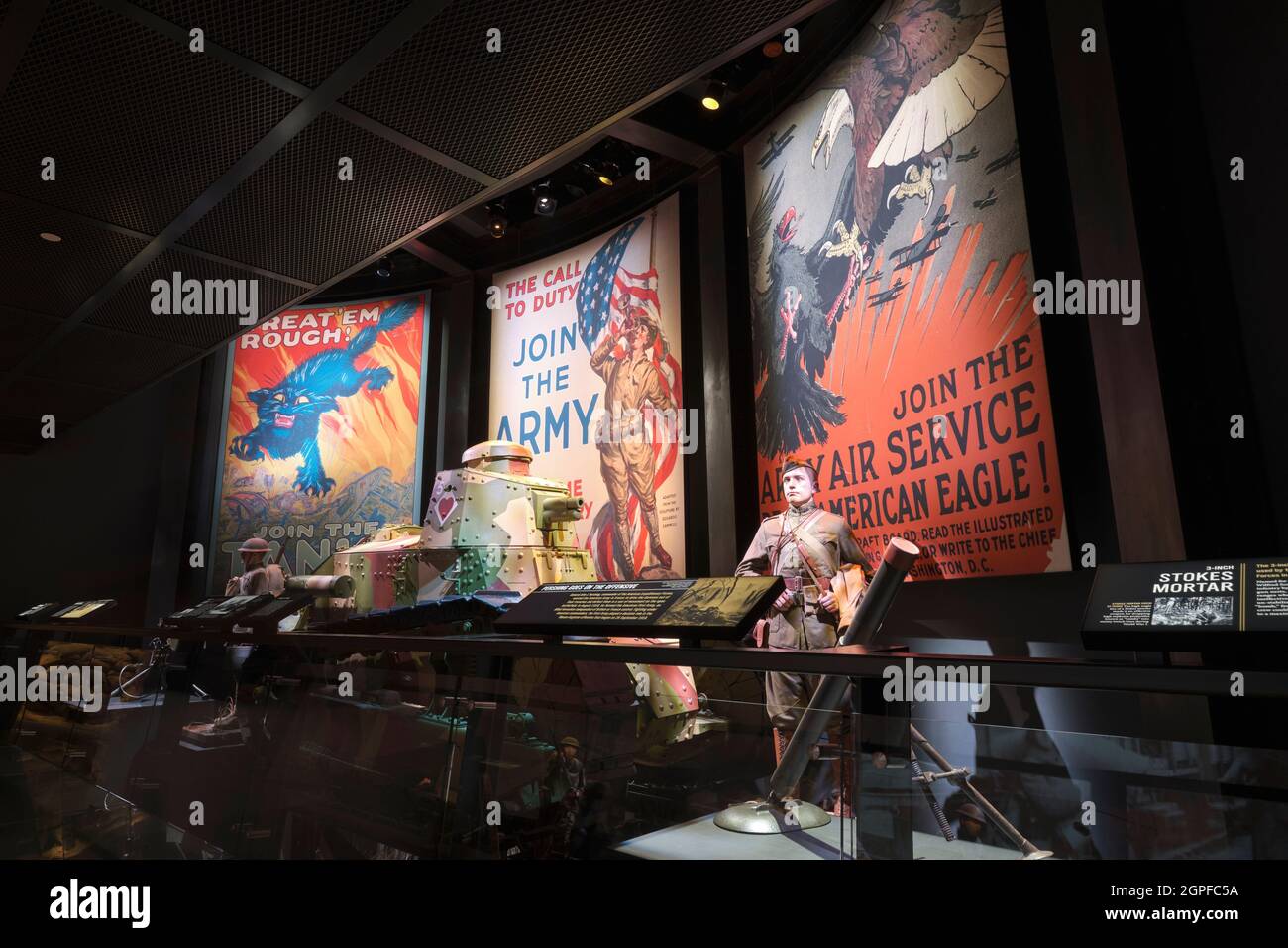 Soldiers in front of WWI recruiting, propaganda posters. At the National Museum of the United States Army at Fort Belvoir, Virginia. Stock Photo