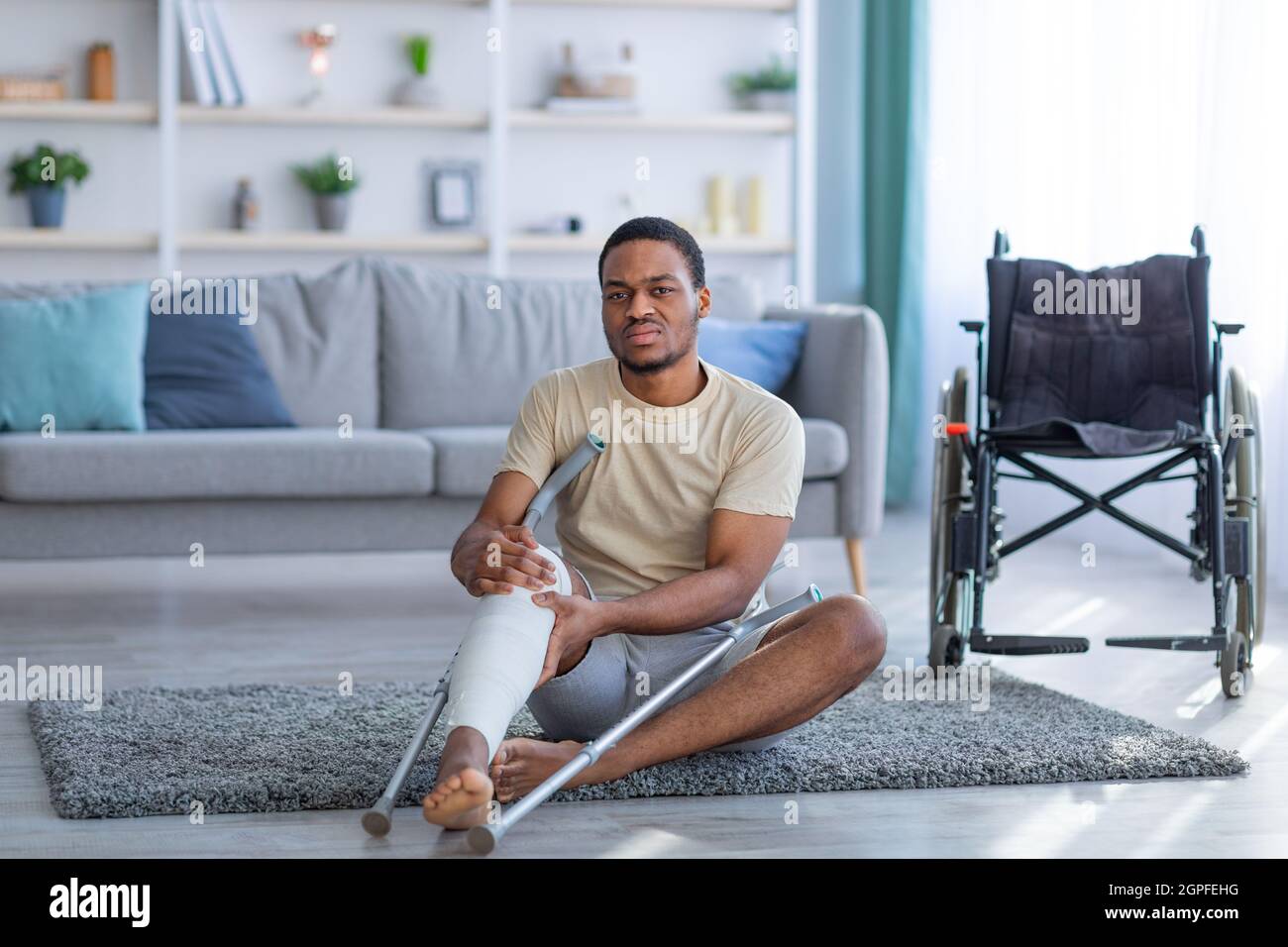 Wheelchair and crutches for mobility hires stock photography and