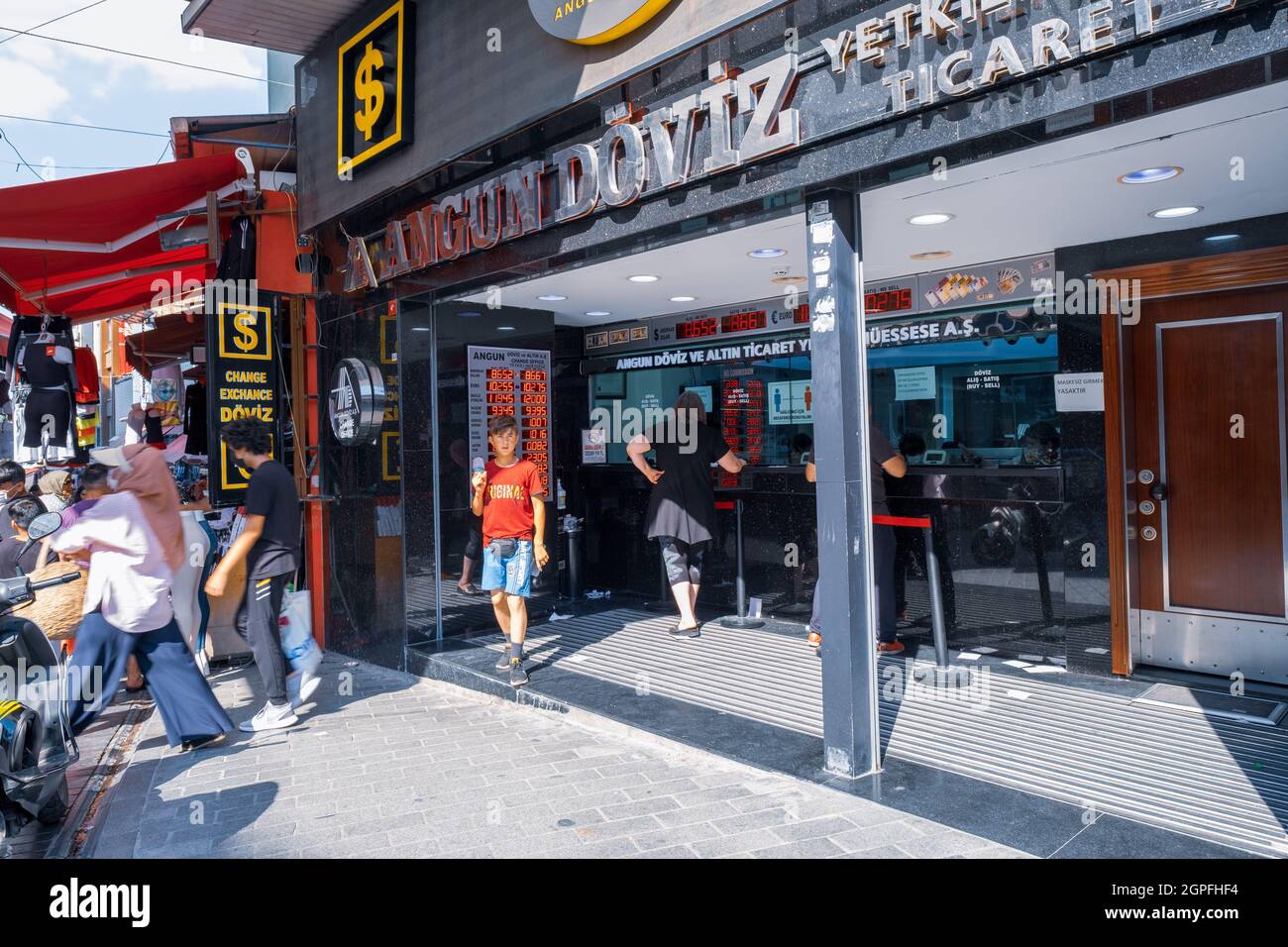 "Eminonu, Istanbul, Turkey - 07.05.2021: exterior view of Turkish exchange office and some people change deposit cash or convert money in bureau de ch Stock Photo