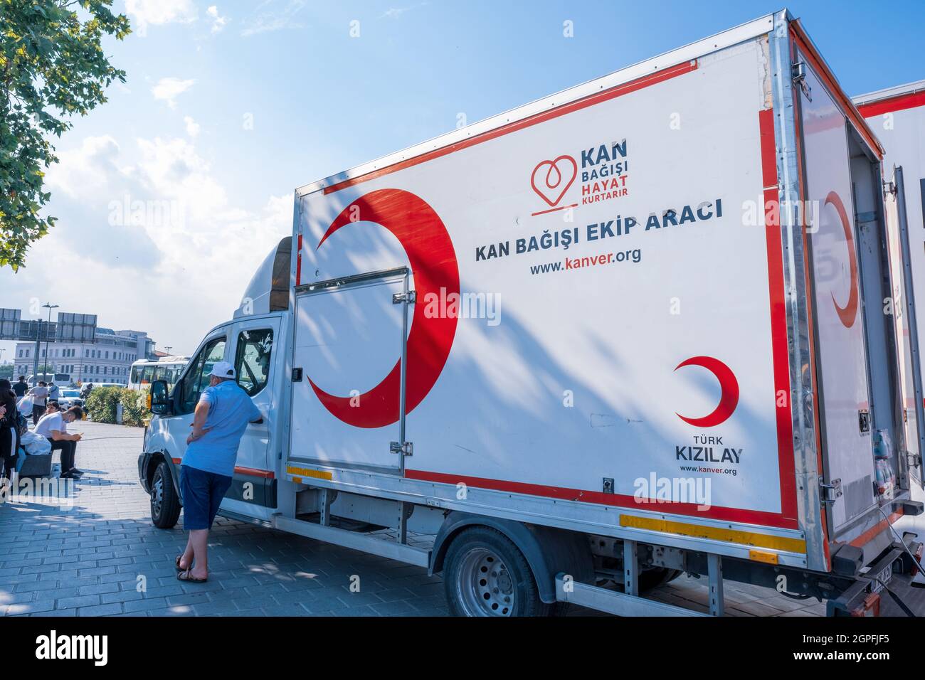 Eminonu, Istanbul, Turkey - 07.05.2021: blood donation vehicle of Turkish Red Crescent (Türk Kizilay) parked in square in a hot summer day with copy s Stock Photo