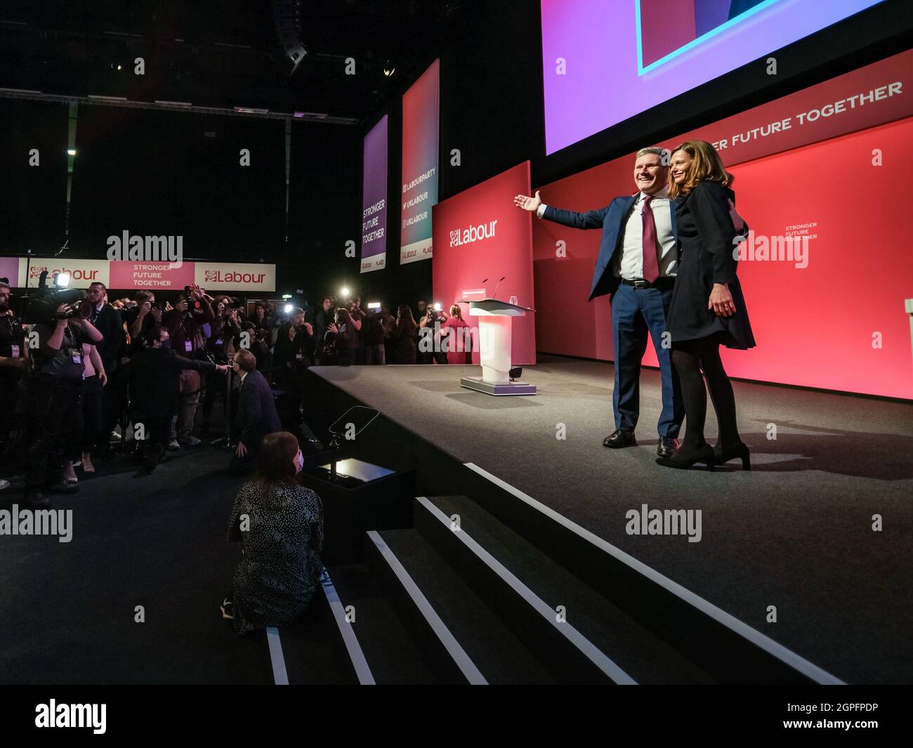 Brighton, UK. 29th Sep, 2021. Brighton, Uk. Wednesday, Sep. 29, 2021 . Sir Keir Starmer, Leader of the Labour Party embraces his wife Victoria after delivering the closing keynote speech. Labour Party 2021 Conference Credit: Julie Edwards/Alamy Live News Stock Photo