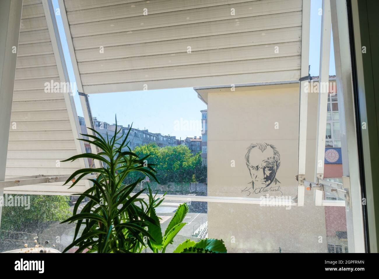 Findikzade, Istanbul, Turkey - 07.16.2021: Mustafa Kemal Ataturk, founder of Turkey Republic, signature and drawing picture on a school building from Stock Photo