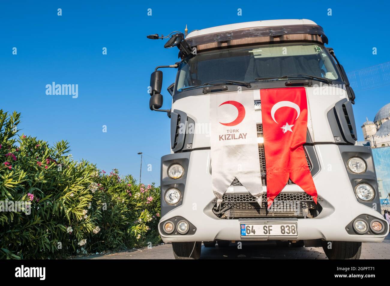 Eminonu, Istanbul, Turkey - 07.20.2021: copy space for Turkish Red Crescent (Türk Kizilay) blood donation transportation lorry with flag in square in Stock Photo