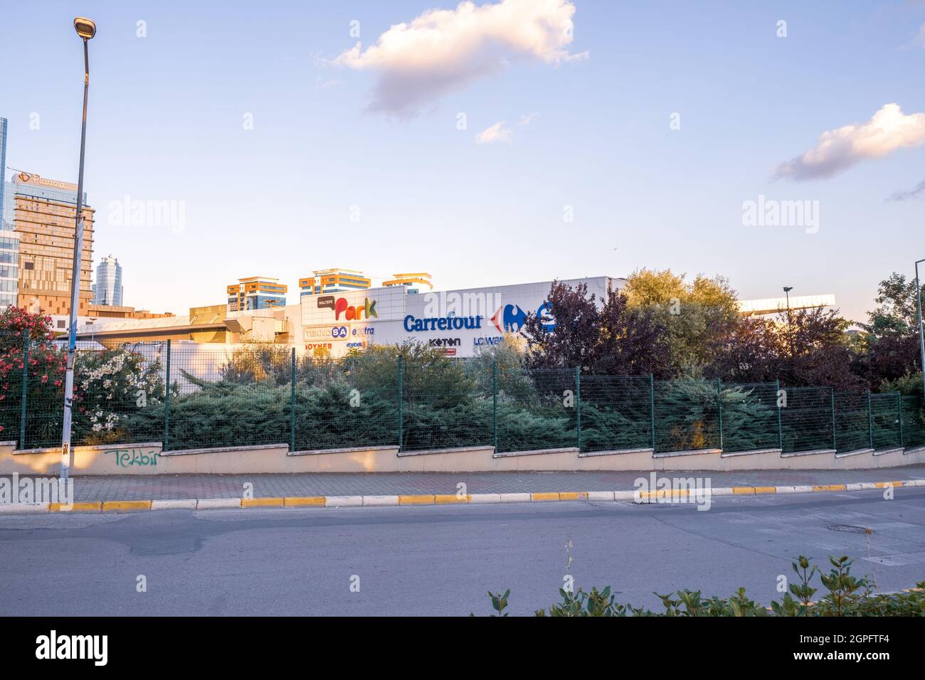 Maltepe, Istanbul, Turkey - 07.22.2021: wide angle view of Maltepe Park Carrefour SA shopping mall with a lot of brands on the building in summer for Stock Photo