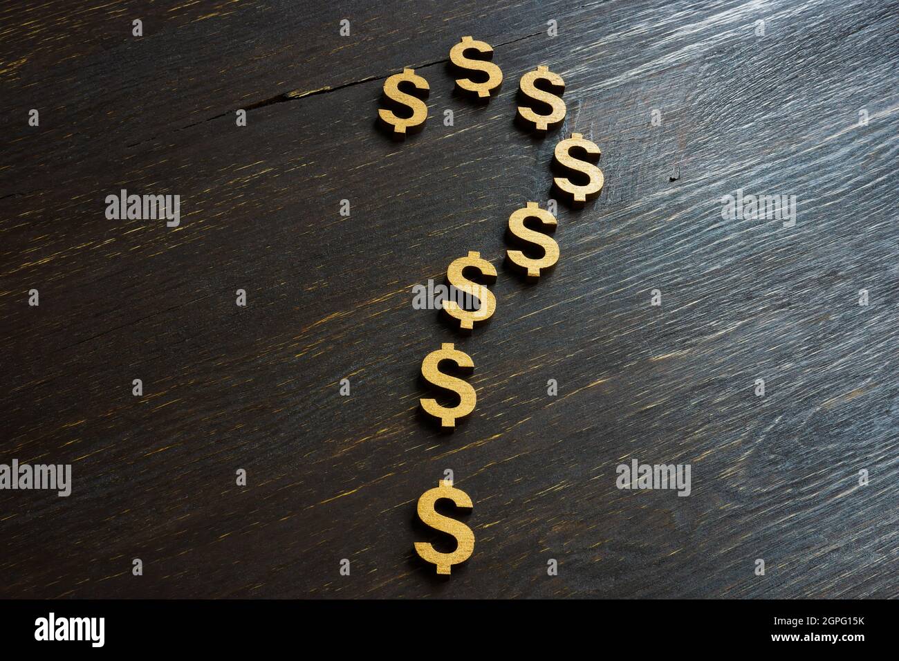 Business uncertainty in trading. A question mark made from dollar signs. Stock Photo