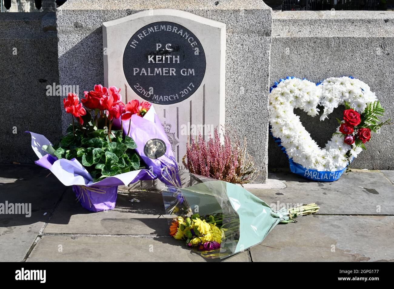 London, UK. Sept 29th 2021:On the approach of what would have been his 53rd birthday on 3rd October 2021, floral tributes were laid for PC Keith Palmer who was murdered during a terrorist attack on Parliament on 22.03.2017. PC Palmer was postumously awarded the George Medal, the second highest award for gallantry 'not in the face of the enemy'. Houses of Parliament, Westminster. Credit: michael melia/Alamy Live News Stock Photo