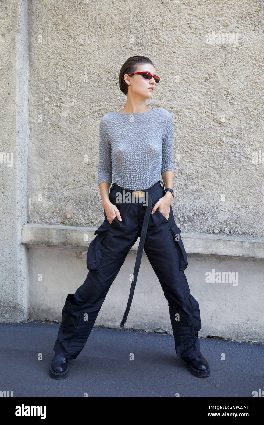 https://c8.alamy.com/comp/2GPG5A1/milan-italy-september-24-2021-woman-with-black-cargo-trousers-and-pink-and-black-sunglasses-before-prada-fashion-show-milan-fashion-week-street-2GPG5A1.jpg