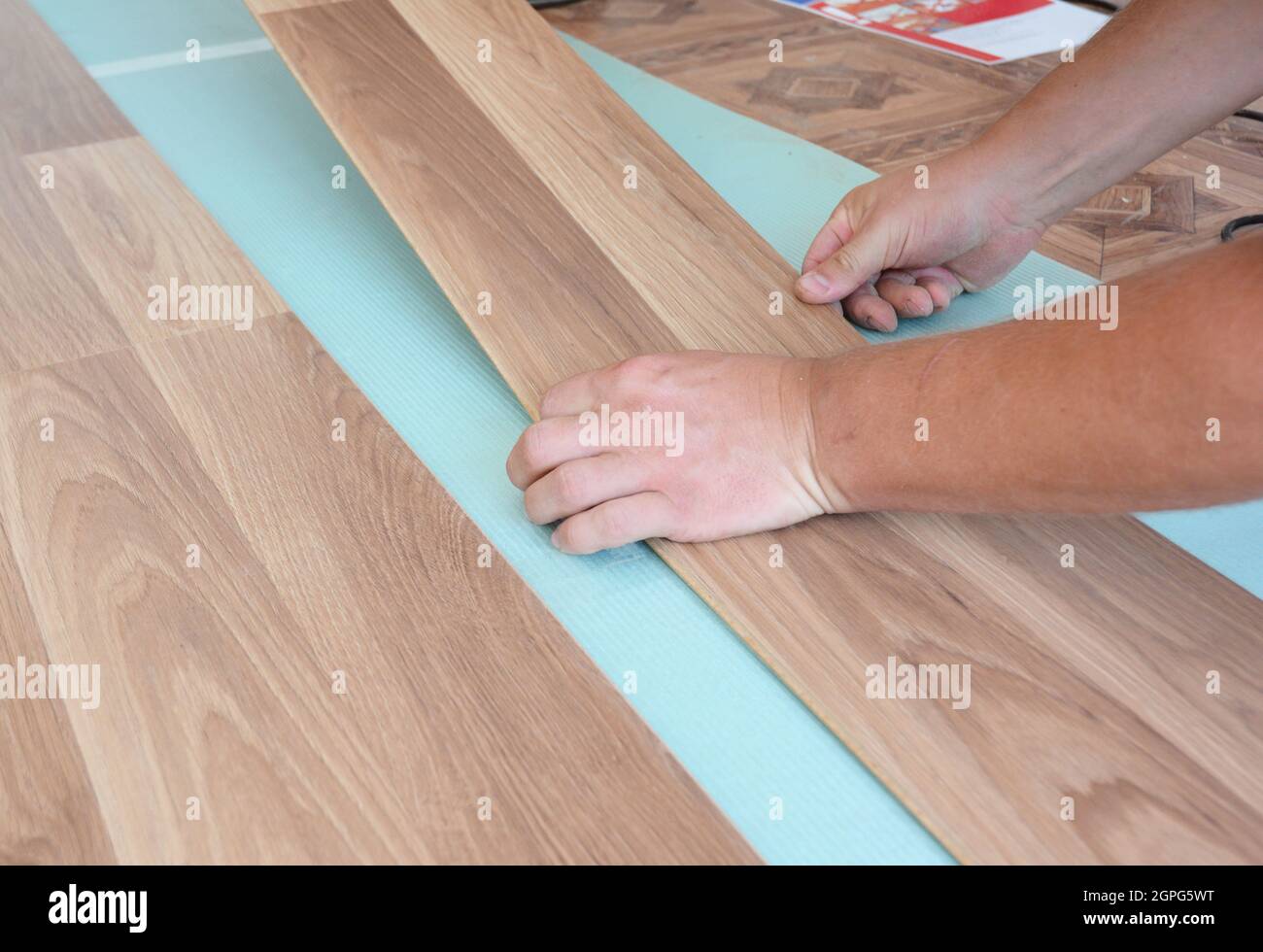 Laminate flooring installation. Installing wooden Laminate Flooring