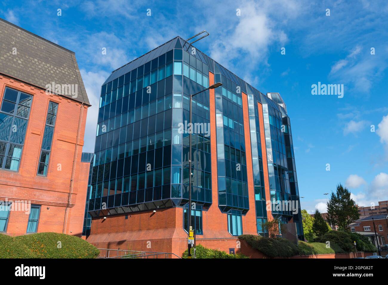 Red brick and blue glass 1980s office building in Edgbaston, Birmingham, UK Stock Photo