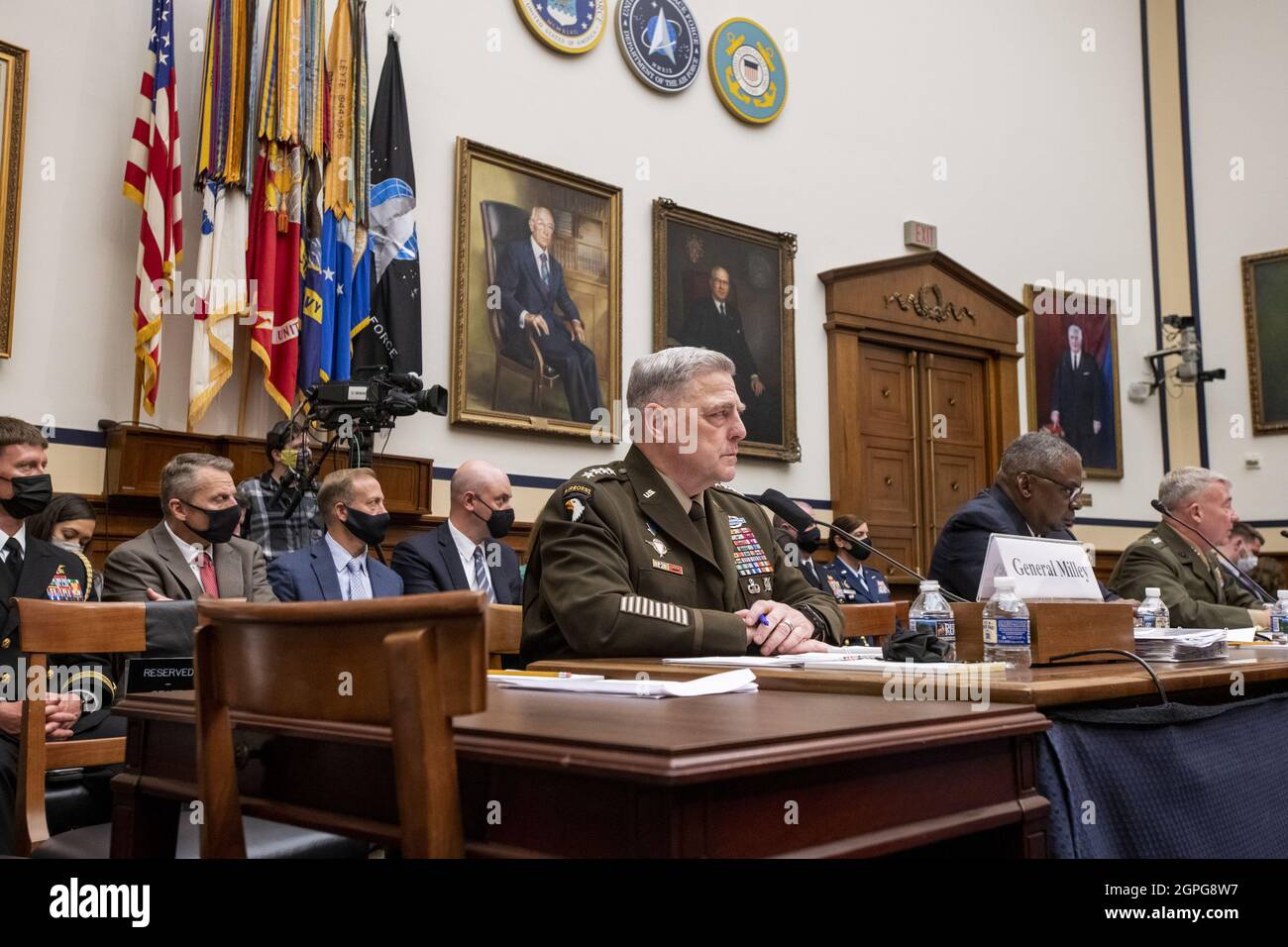 Washington, United States. 29th Sep, 2021. General Kenneth McKenzie Jr., USMC Commander, U.S. Central Command, left, United States Secretary of Defense Lloyd J. Austin III, center, and United States Army General Mark A. Milley, Chairman of the Joint Chiefs of Staff, right, appear before a House Armed Services Committee hearing on the conclusion of military operations in Afghanistan at the Rayburn House Office building on Capitol Hill on Wednesday, September 29, 2021 in Washington, DC. Pool photo by Roy Lamkey/UPI Credit: UPI/Alamy Live News Stock Photo