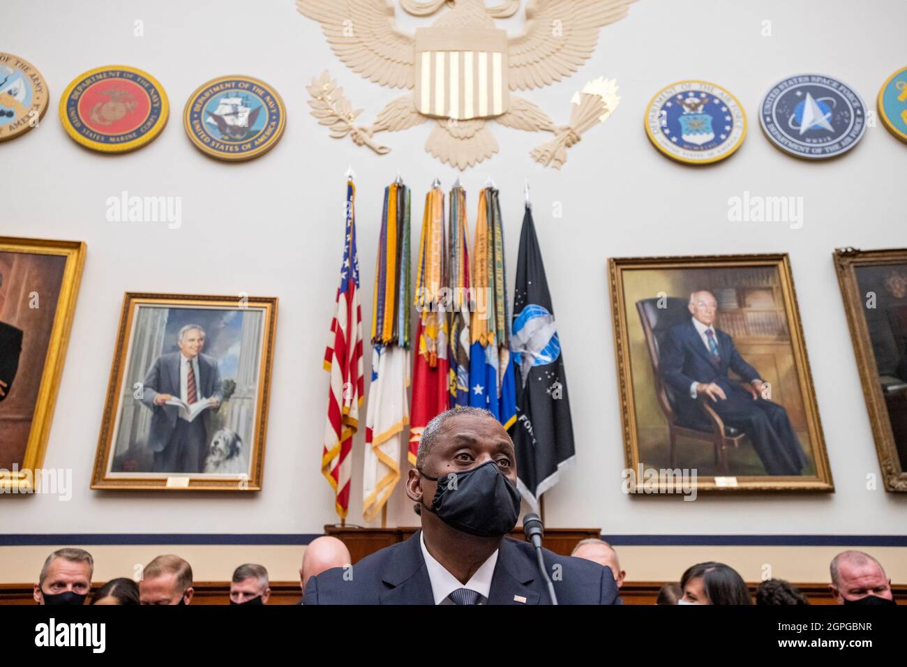 United States Secretary of Defense Lloyd J. Austin III takes his seat