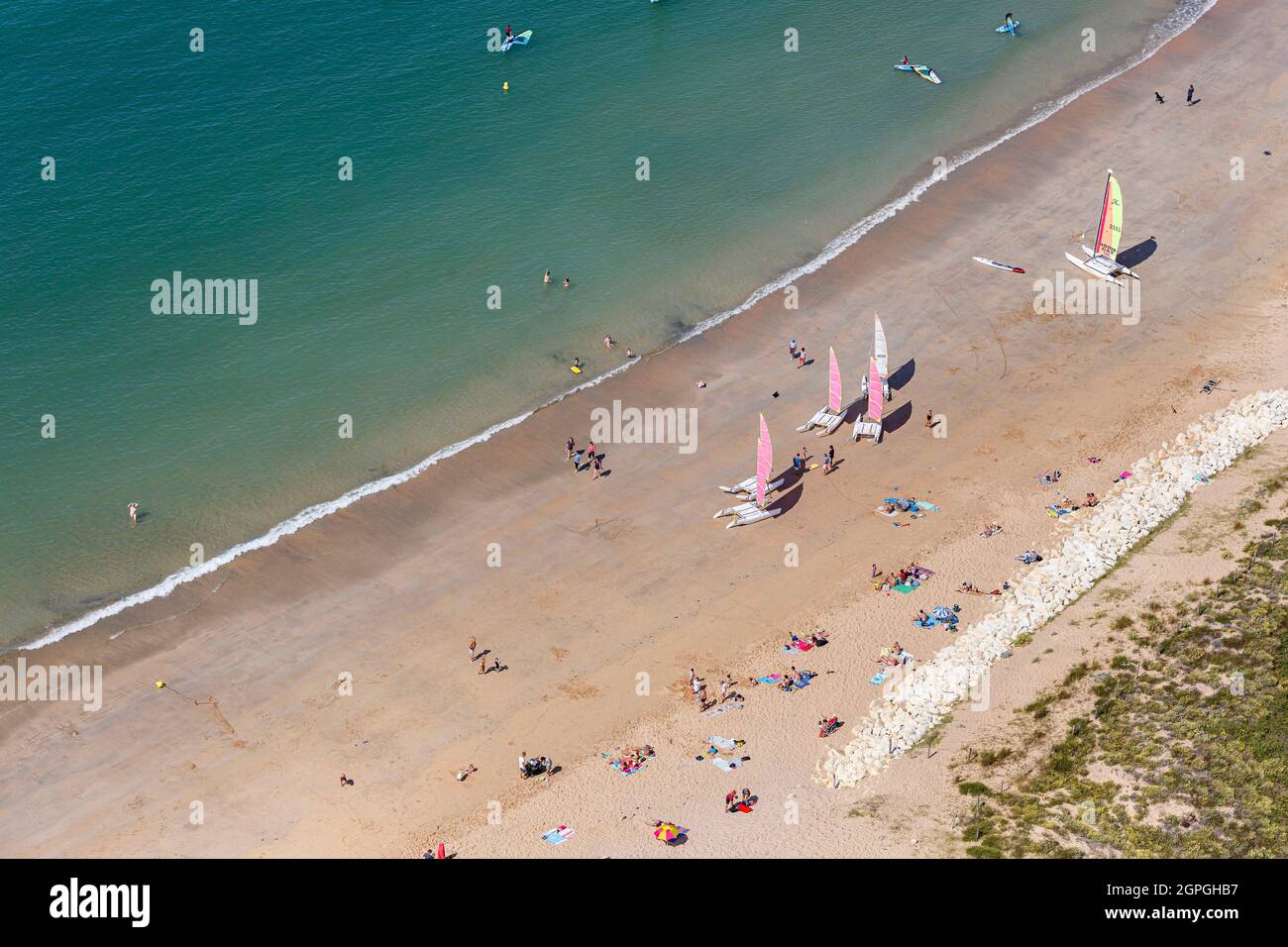 France, Charente Maritime, Dolus d'Oleron, sail boats and swimmers on La Perroche beach (aerial view) Stock Photo