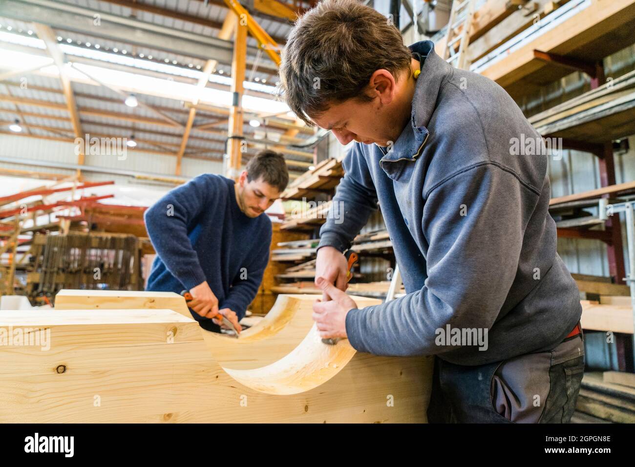 France, Finistere, Brest, Guip Shipyard, marine carpenters work on pieces of wood Stock Photo