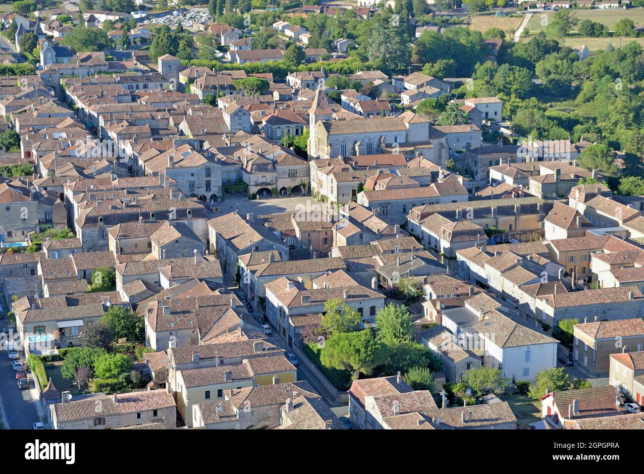 France, Dordogne, Monpazier, labelled Les Plus Beaux Villages de France (The Most Beautiful Villages of France), the walled city square and the church (vue aérienne) Stock Photo