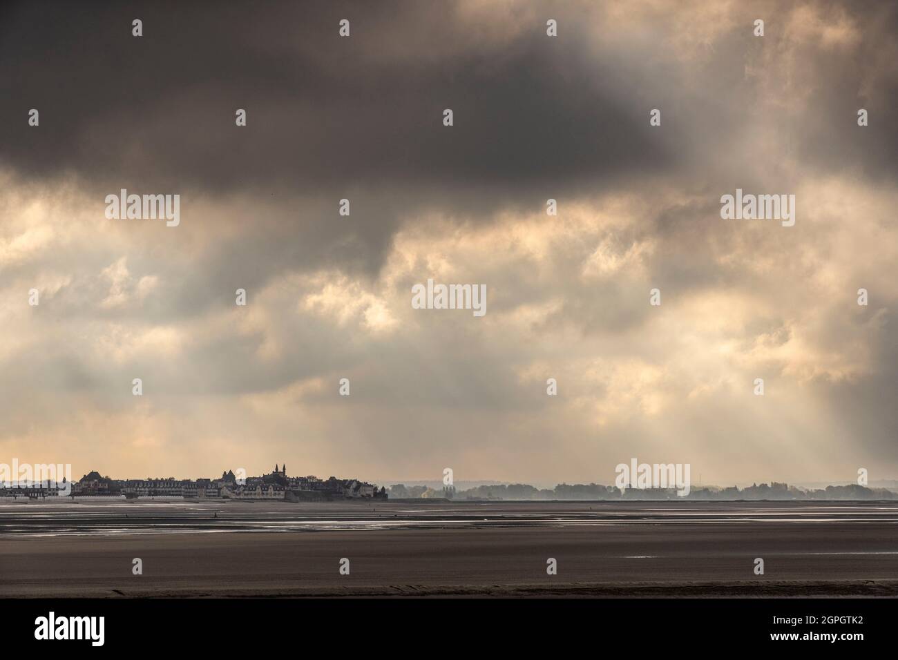 France, Somme, Baie de Somme, Le Hourdel, Stormy sky over Le Crotoy seen from Le Hourdel at low tide Stock Photo
