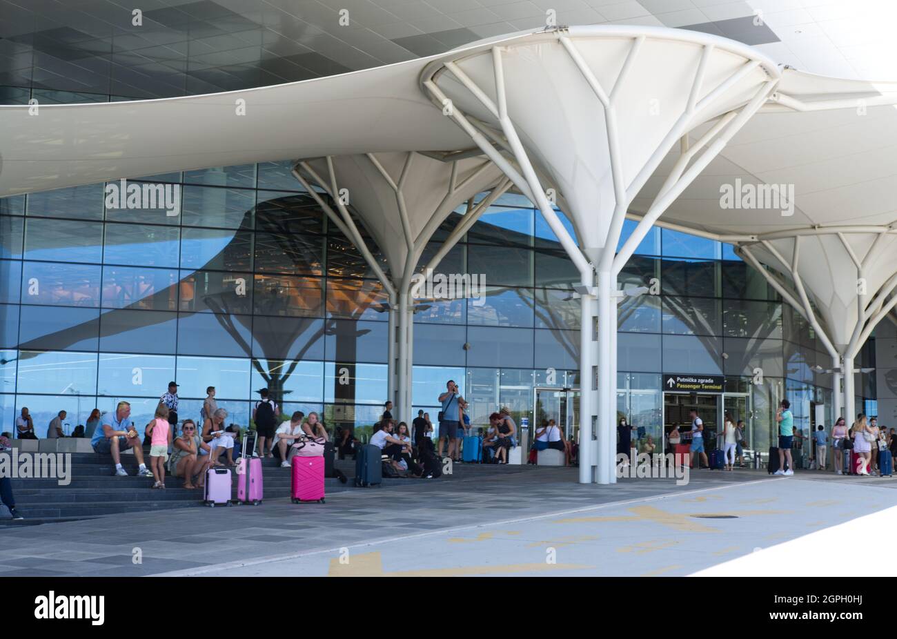 SPLIT, CROATIA. AUGUST 19, 2021. Tourists waiting at the airport Stock Photo