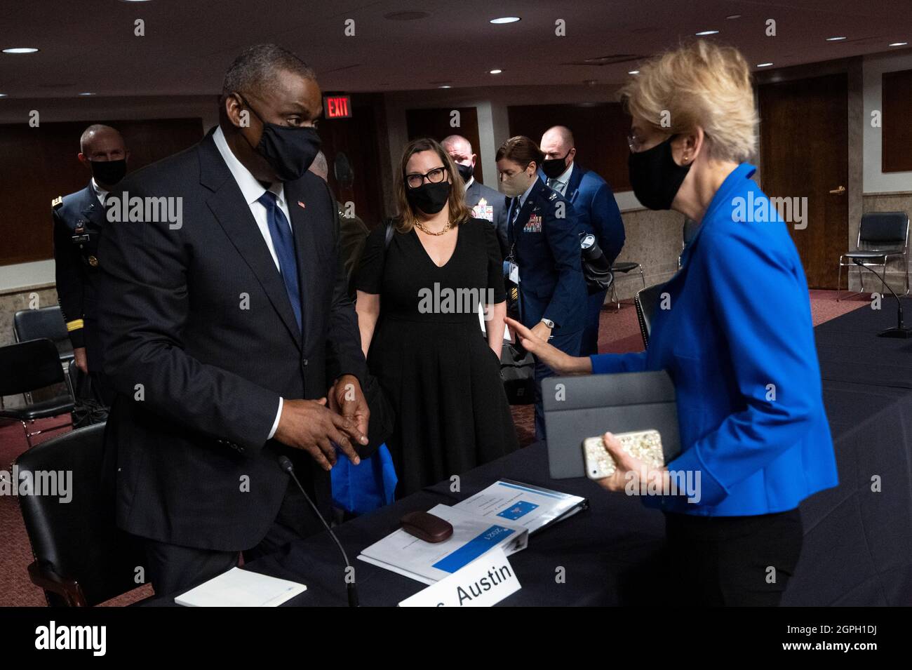 Washington, United States Of America. 28th Sep, 2021. Washington, United States of America. 28 September, 2021. U.S. Secretary of Defense Lloyd Austin, left, speaks with Senator Elizabeth Warren of Massachusetts, before testifying before the Senate Armed Services Committee on the withdrawal from Afghanistan September 28, 2021 in Washington, DC Credit: Chad McNeeley/DOD/Alamy Live News Stock Photo