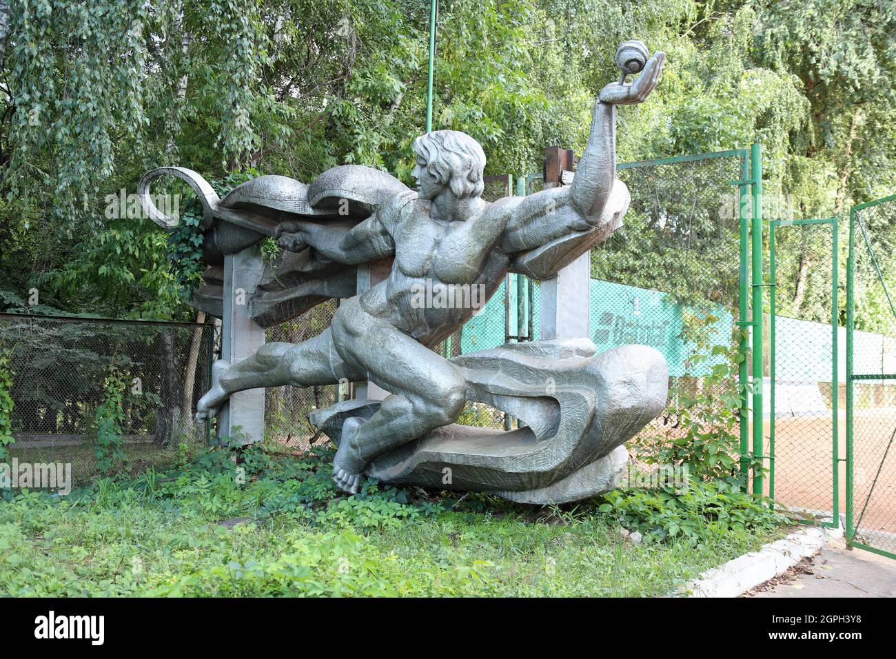 Soviet sculpture of a tennis player in Chisinau Stock Photo