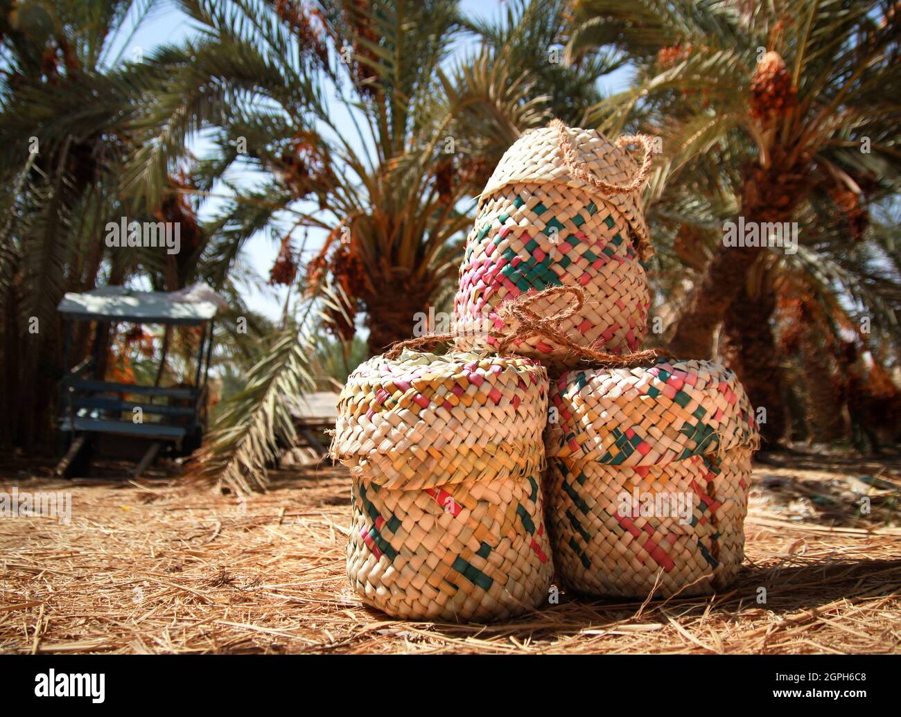 The traditional straw plaited bags of Siwa are still used widely in the Oasis. Stock Photo
