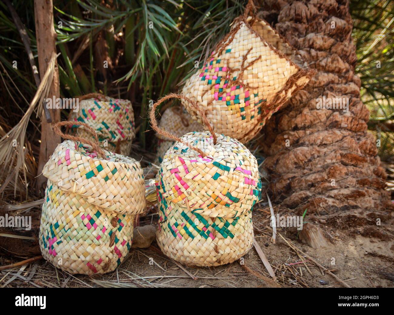 The traditional straw plaited bags of Siwa are still used widely in the Oasis. Stock Photo