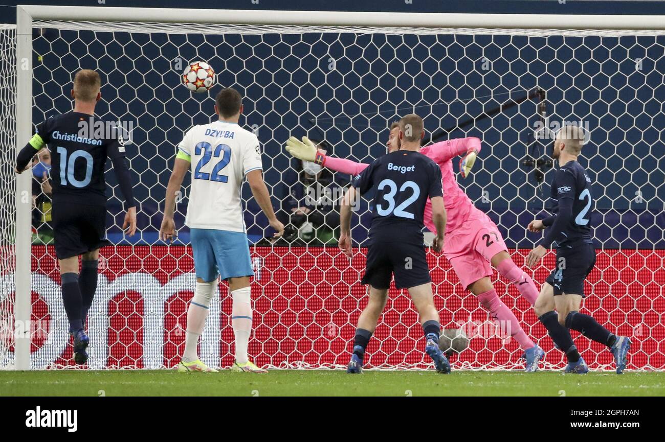 St Petersburg, Russia. 29th Sep, 2021. Malmo FF's goalkeeper Johan Dahlin  (R back) lets in a goal in a UEFA Champions League Group H football match  between Zenit St Petersburg and Malmo