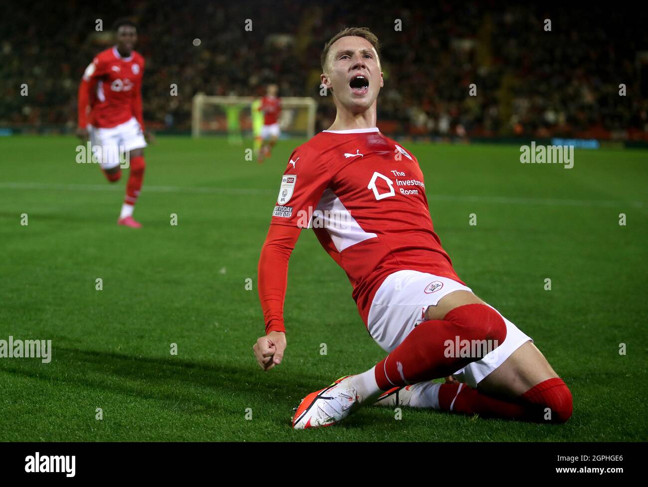 Barnsley's Cauley Woodrow celebrates after scoring from the penalty spot to put his side ahead during the Sky Bet Championship match at Oakwell, Barnsley. Picture date: Wednesday September 29, 2021. Stock Photo