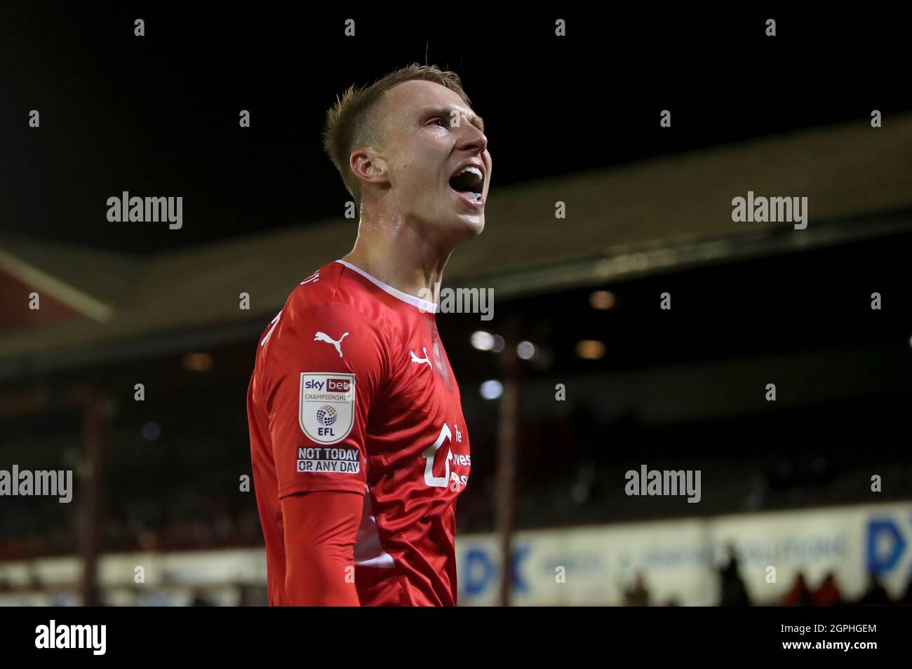 Barnsley's Cauley Woodrow celebrates after scoring from the penalty spot to put his side ahead during the Sky Bet Championship match at Oakwell, Barnsley. Picture date: Wednesday September 29, 2021. Stock Photo