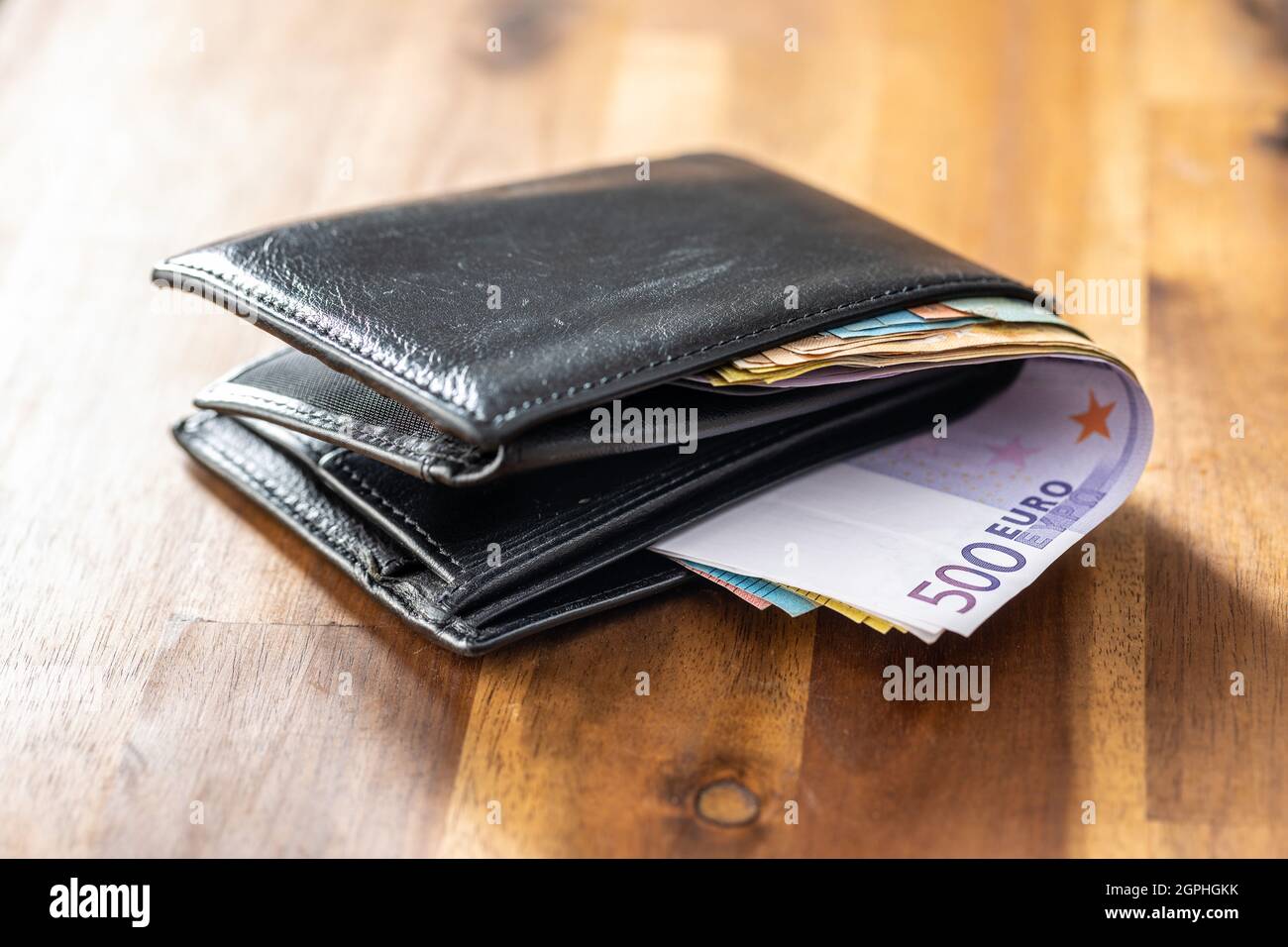 Leather wallet and euro money. Euro banknotes. Stock Photo