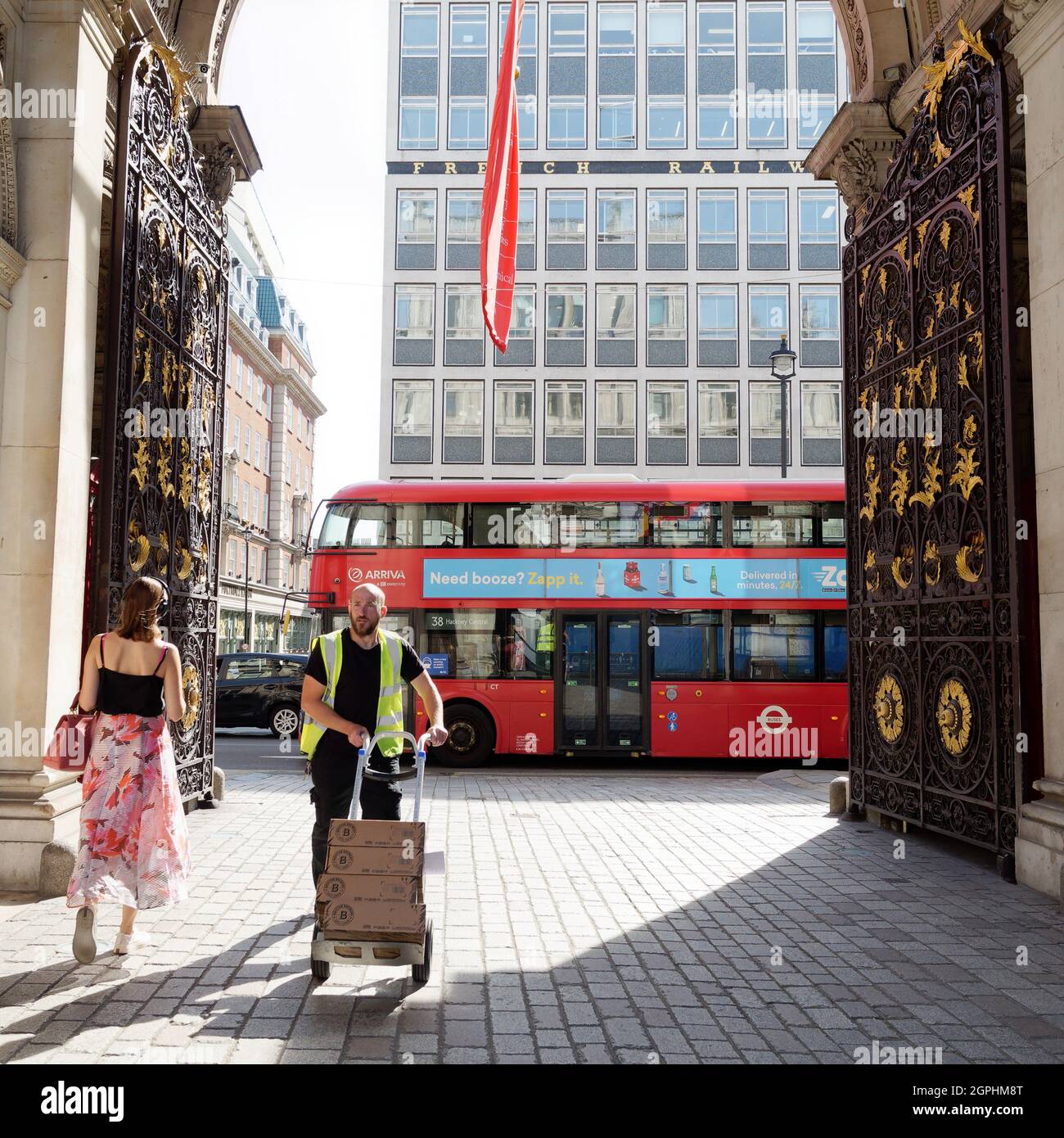 London, Greater London, England, September 21 2021: Piccadilly seen from the entrance to the Royal Academy of Arts with a delivery man. Stock Photo