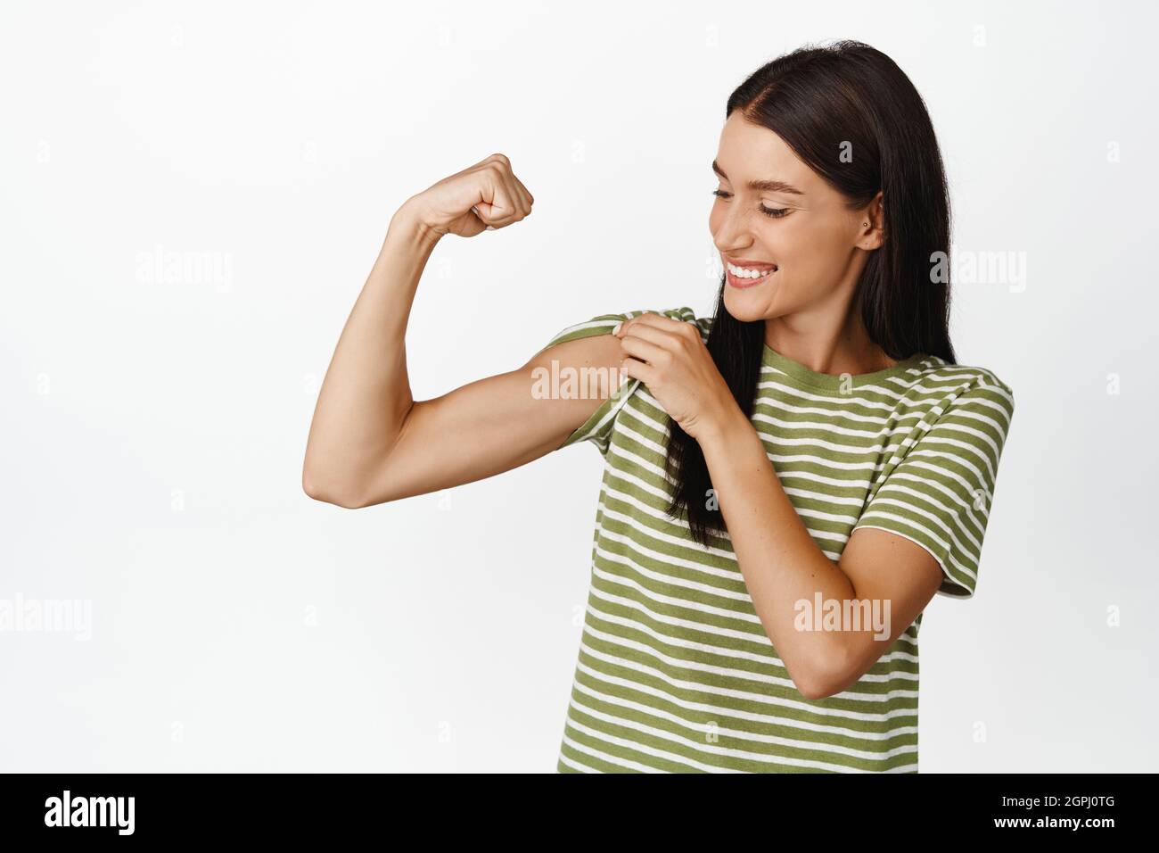Flexing muscles white background hi-res stock photography and images - Page  2 - Alamy