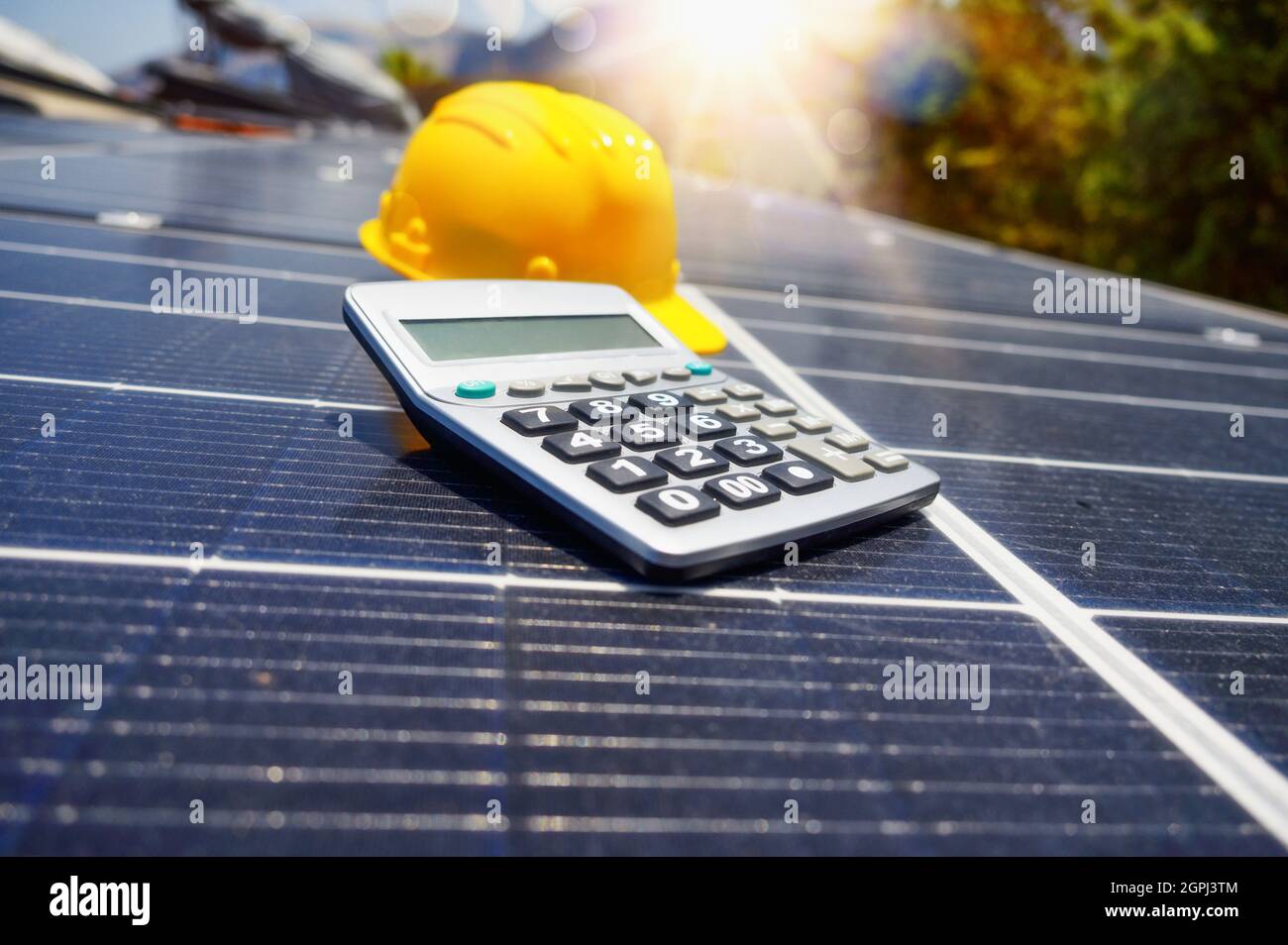 Renewable energy system with solar panel on the roof Stock Photo